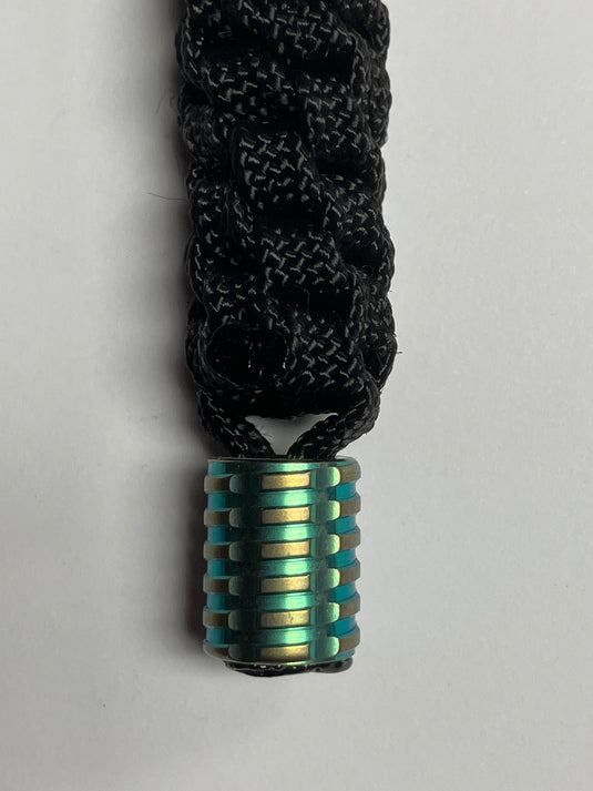 Anchor's Knot Black 550 Paracord Spiral Knot Lanyard with Green Titanium Bead