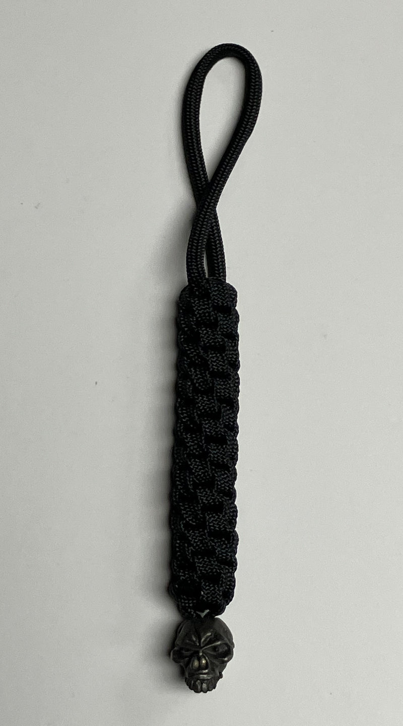 Cargue la imagen en el visor de la galería, Anchor&#39;s Knot 550 Paracord Spiral Knot Lanyard with Emerson Skull Bead, Black (AKBESB)
