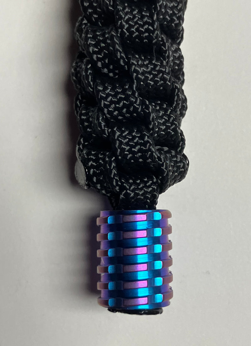 Cargue la imagen en el visor de la galería, Anchor&#39;s Knot Black 550 Paracord Spiral Knot Lanyard with Purple &amp; Blue Titanium Bead (AKPTB)
